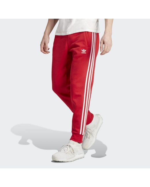 Adicolor Classics 3-Stripes Pantalones adidas de hombre de color Rojo | Lyst