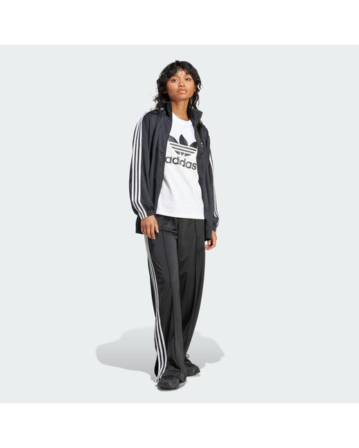 adidas Firebird Loose Tracksuit Bottoms in Black Lyst UK