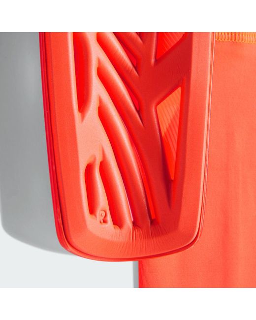 Parastinchi Tiro League di Adidas in Orange