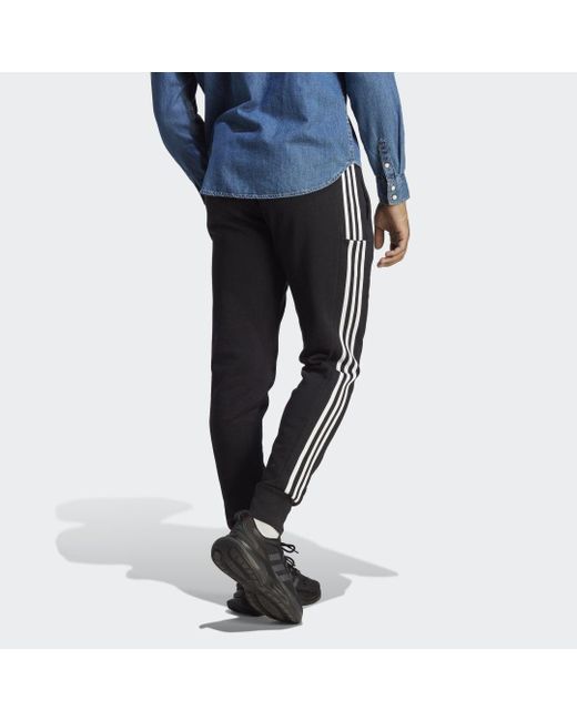 Adidas Blue Essentials French Terry Tapered Cuff 3-stripes Joggers for men