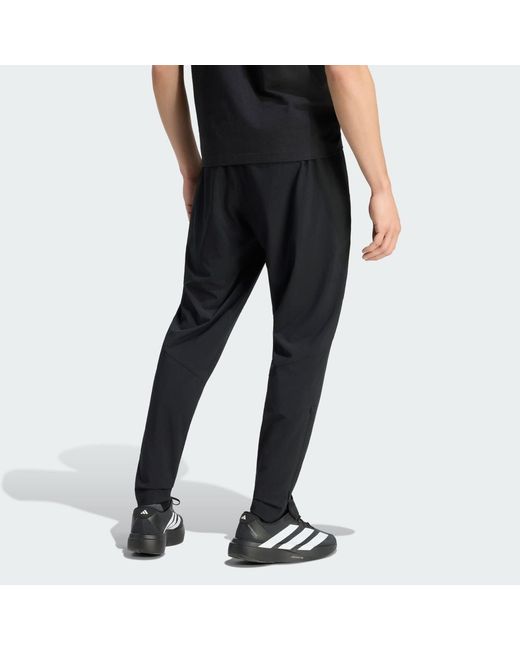 Adidas Black Real Madrid Tiro Travel Tracksuit Bottoms for men