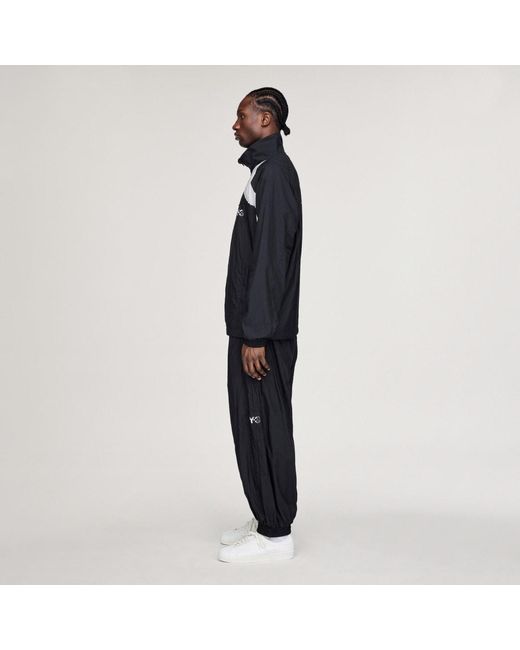 Adidas Blue Y-3 Raw Edge 3 Stripes Nylon Shell Tracksuit Bottoms for men