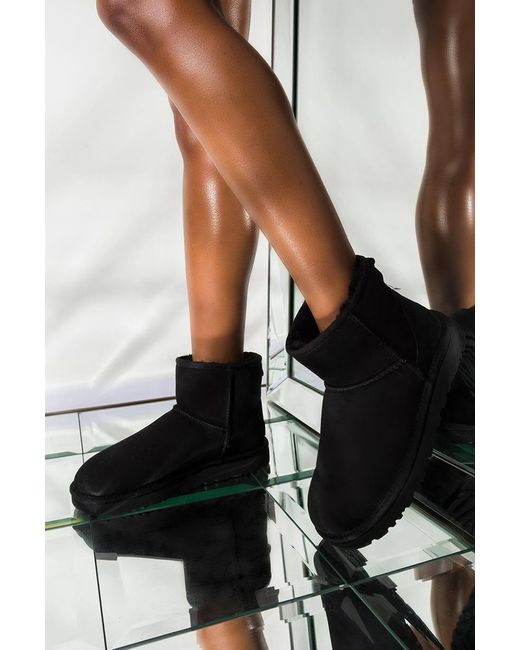 ugg black classic mini