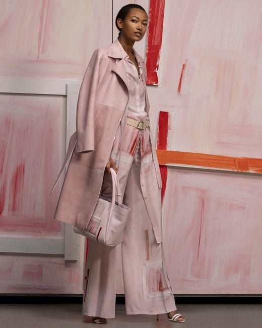 pink leather trench coat