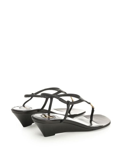 Saint Laurent Black "cassandre" Wedges