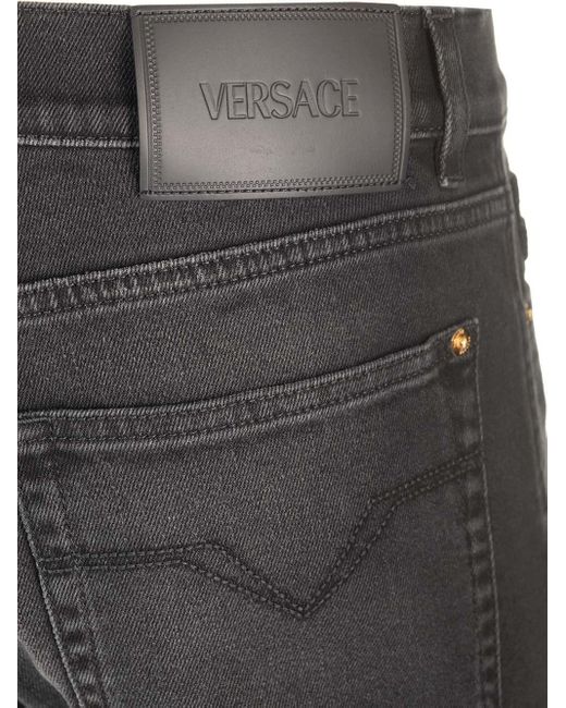 Versace Black Medusa Head-Embellished Mid-Rise Slim-Fit Jeans for men