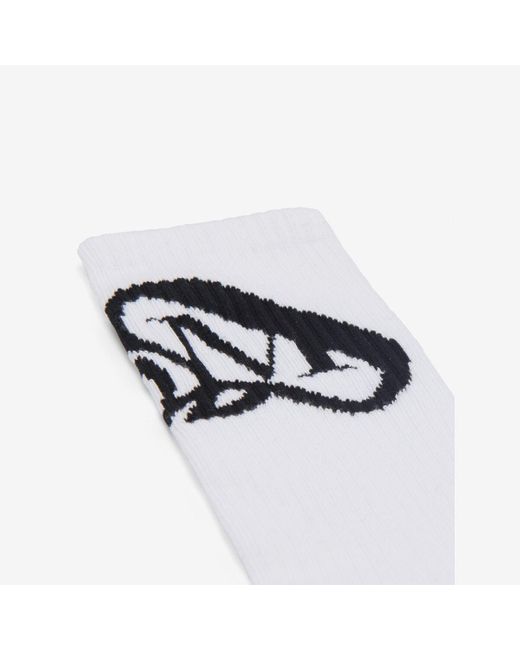 Chaussettes à logo seal Alexander McQueen pour homme en coloris White