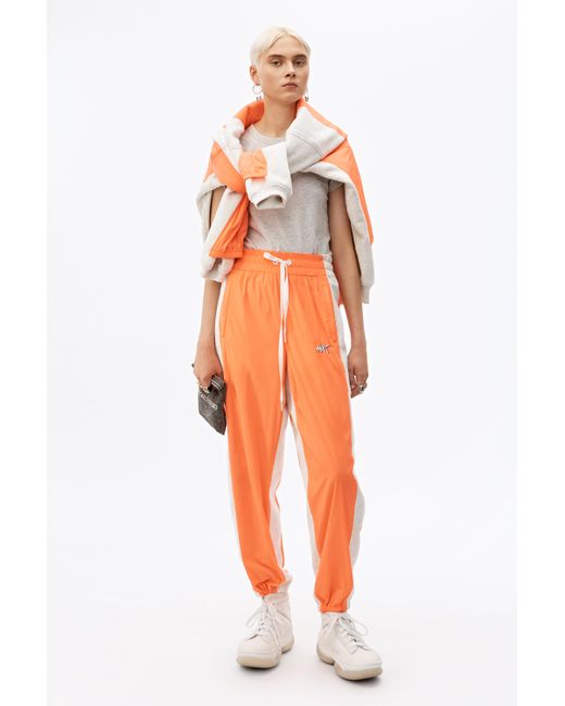 Alexander Wang Washed Nylon Pants in Orange | Lyst