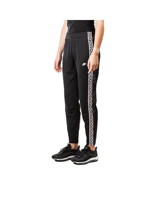 Nike Wmns Nsw Taped Poly Pant in Black - Lyst