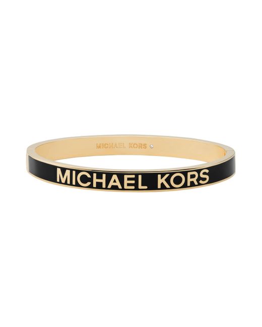 Michael Kors Metallic Brass Logo Bangle Bracelet For