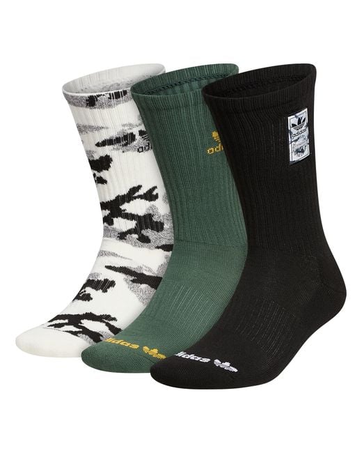 Black and top green adidas socks