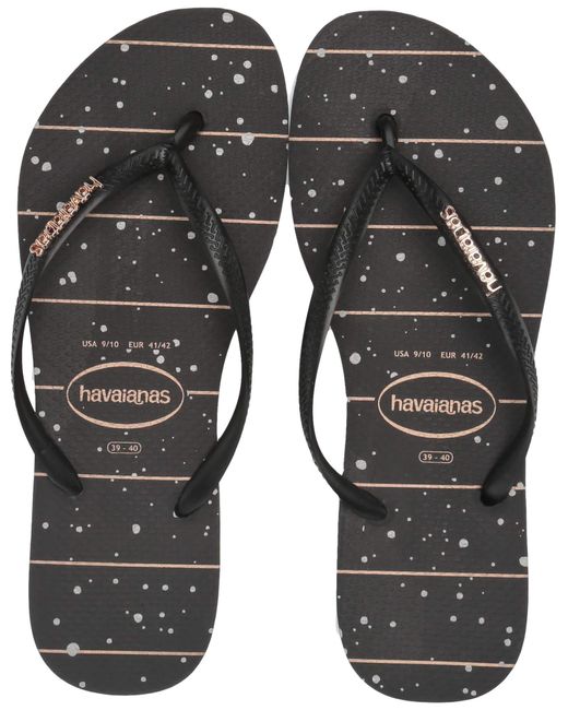 Black slim havaianas with gold logo hot sale
