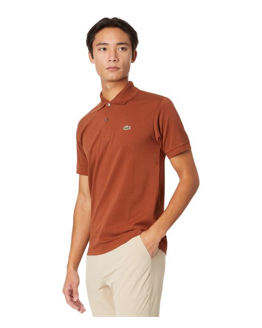 Lacoste Orange L1212 Classic Short Sleeve Pique Polo Shirt for men