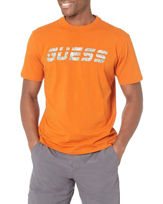 man in an orange shirt amazon prime
