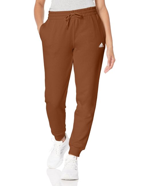 adidas Essentials Linear French Terry Cuffed Pants in Brown | Lyst