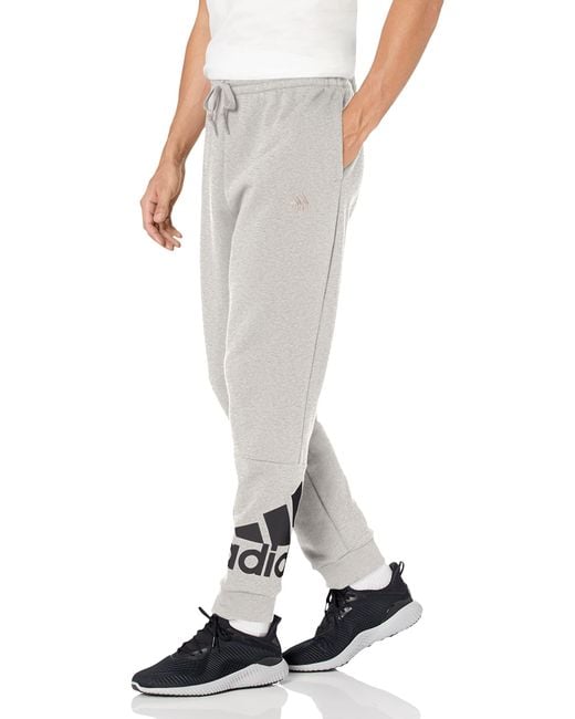 adidas Size Essentials Fleece Tapered Cuff Logo Pants in White for Men Lyst