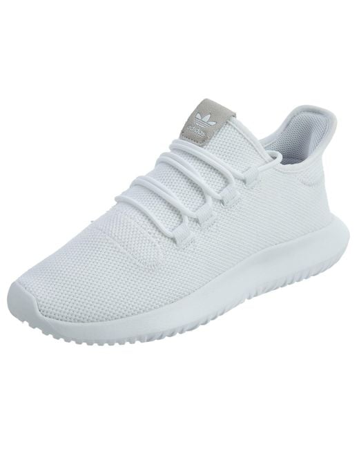 white adidas tubular shoes