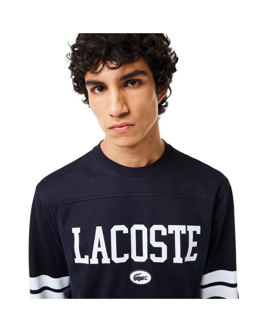 Lacoste Blue Long Classic Fit Tee Shirt W/large Wording On Front And Stripes To Sleeves for men