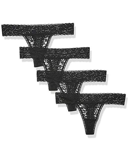 Essentials Womens 4-Pack Seamless Bonded Stretch Thong Panty