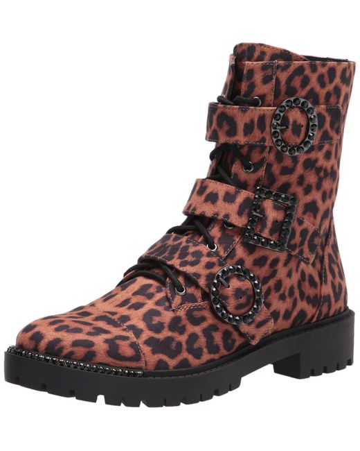 kirlah boot in patent plaid