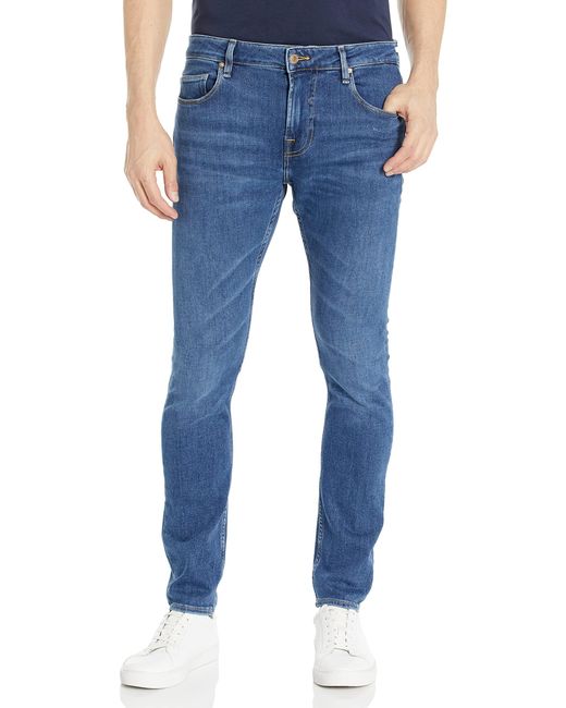 Jeans skinny da uomo Eco Chris a vita bassa di Guess in Blue da Uomo