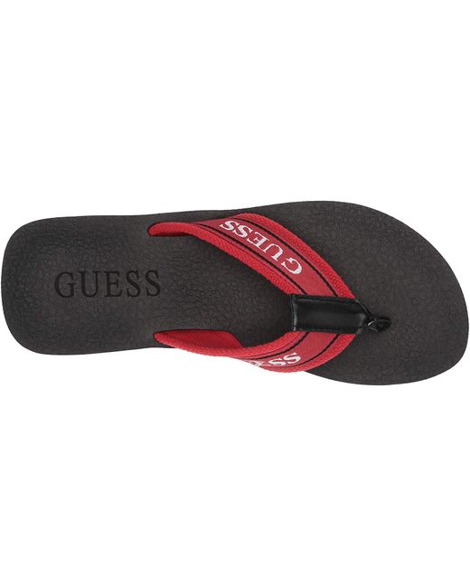red guess flip flops