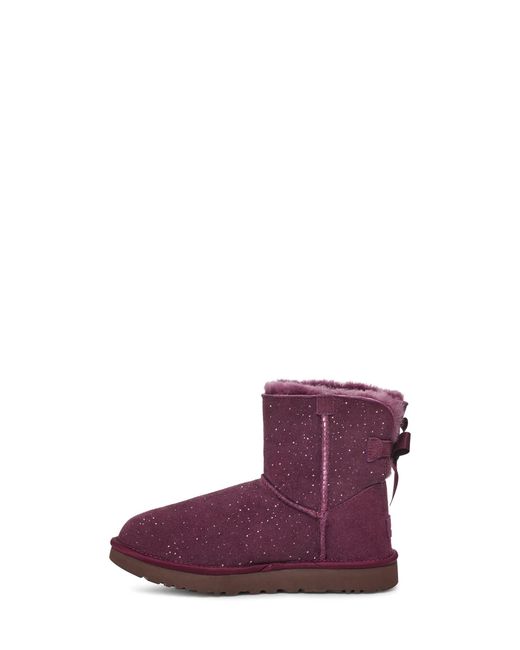 UGG Mini Bailey Bow Metallic Spots Fashion Boot in Purple | Lyst