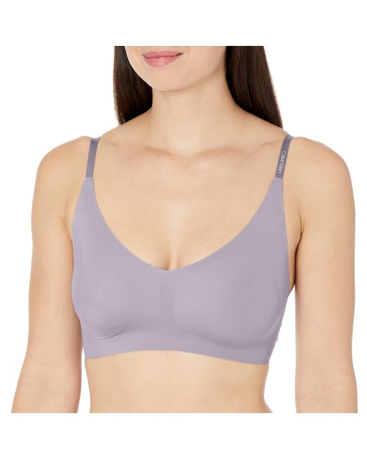 Calvin Klein Invisibles Comfort Lightly Lined Seamless Wireless Triangle Bralette  Bra in Purple - Save 9% | Lyst