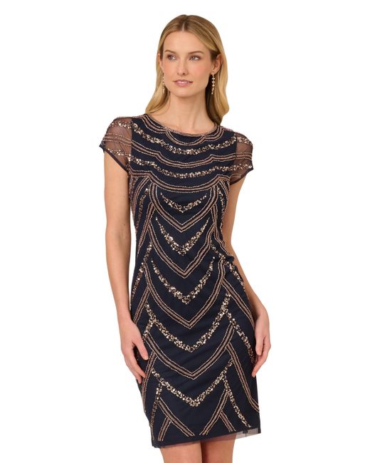 green emerald velvet dress Foil Printed Asymmetric Gown with Ruffled Detail in Navy Gold main image 0