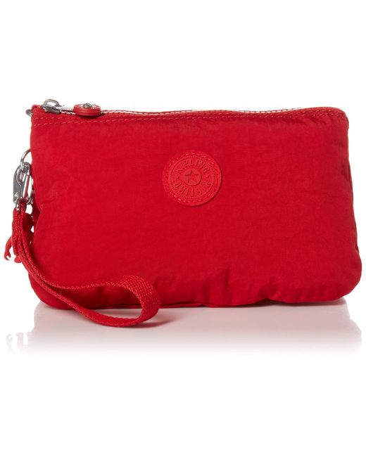 Kipling 's Creativity Extra Large Wristlet in Red | Lyst