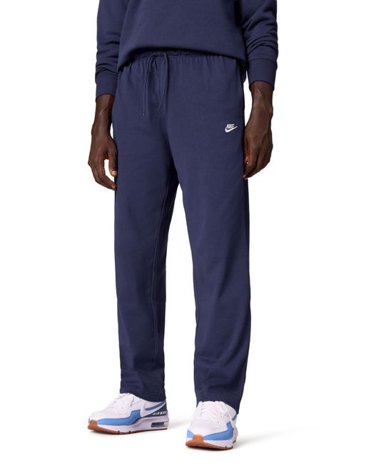 nike open hem club pants
