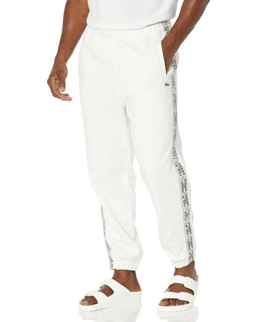 Lacoste White Relaxed Fit Adjustable Waist Sweatpants W Tennis Word Taping Down The Legs for men