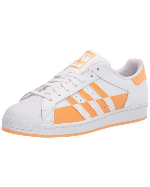 orange shell toe adidas