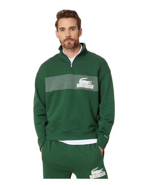 Lacoste Green Loose Fit High Neck 1/4 Zip Sweatshirt With Front Tennis Net Graphic for men