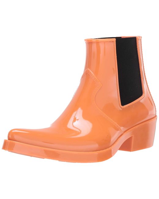 calvin klein orange rubber boots