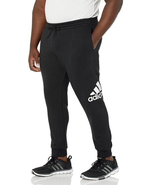 Adidas Black Essentials Fleece Tapered Cuffed Big Logo Pants for men