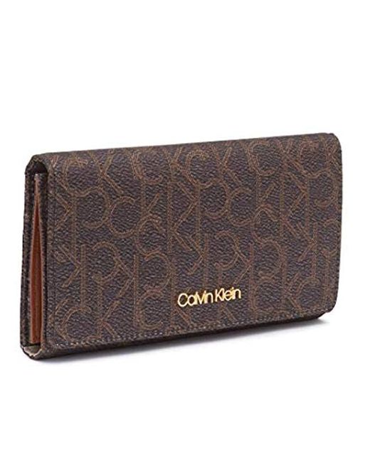 Calvin Klein Monogram Logo Trifold Wallet in Brown Lyst