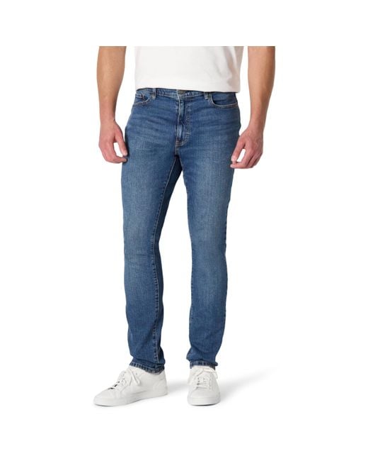 Pantalones Vaqueros de Corte Ceñido y Elasticidad Media Hombre Amazon Essentials de hombre de color Blue