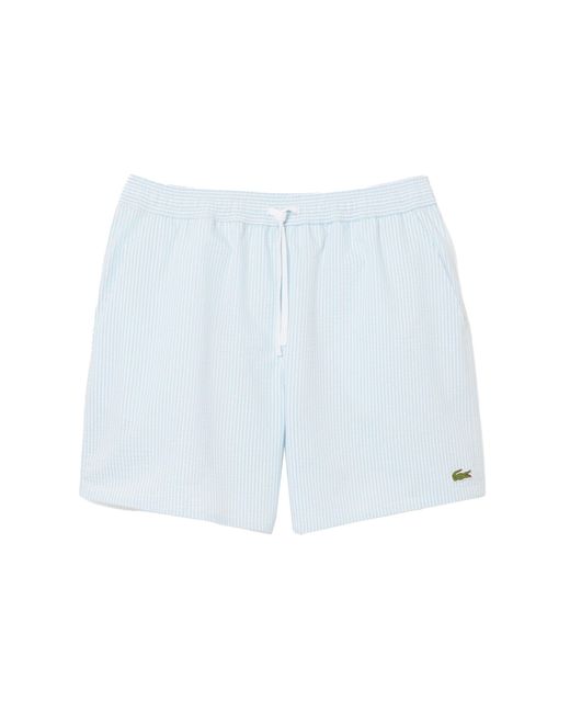 Pantaloncini da bagno a righe di media lunghezza in seersucker di Lacoste in Blue da Uomo