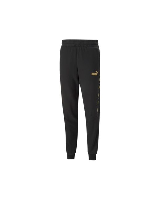 PUMA Pantaloni Uomo Ess+ Tape Golden Sweatpants 673986.01 in Black for Men  | Lyst UK