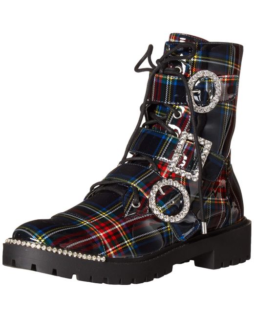 kirlah boot in patent plaid