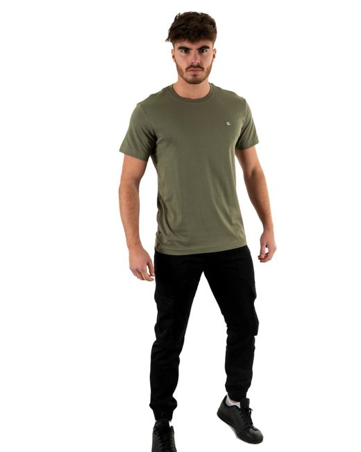 Calvin Klein T-Shirt Kurzarm Ck Embro Badge Tee Rundhalsausschnitt in Green für Herren