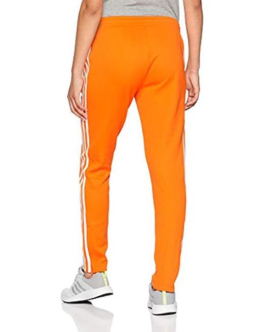 SST TP - Pantalon - Femme adidas en coloris Orange | Lyst