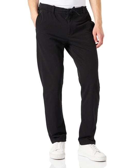 Chino Urban Comfort Knit Pantalones Springfield de hombre de color Negro -  7 % de descuento | Lyst