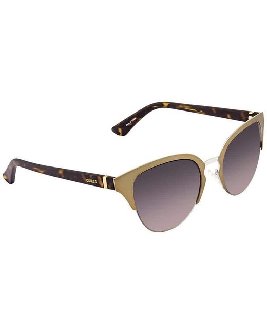 Sunglasses GU 7449 32B gold/gradient smoke di Guess in Natural