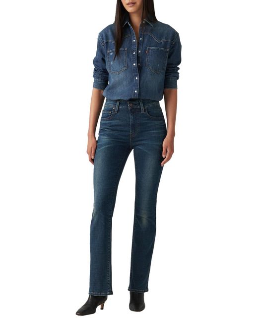 725 High Rise Bootcut Jeans Levi's de color Blue
