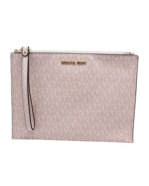 Jet Set Travel XL pochette da polso MK Signature Powder Blush di Michael Kors in Pink