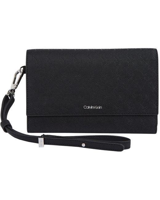 Donna Portafoglio Must Trifold con Cinturino di Calvin Klein in Black