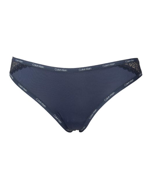 CK slip donna brasiliana pantalone elastico visibile con tessuto logo con inserti in pizzo articolo QF5152O di Calvin Klein in Black