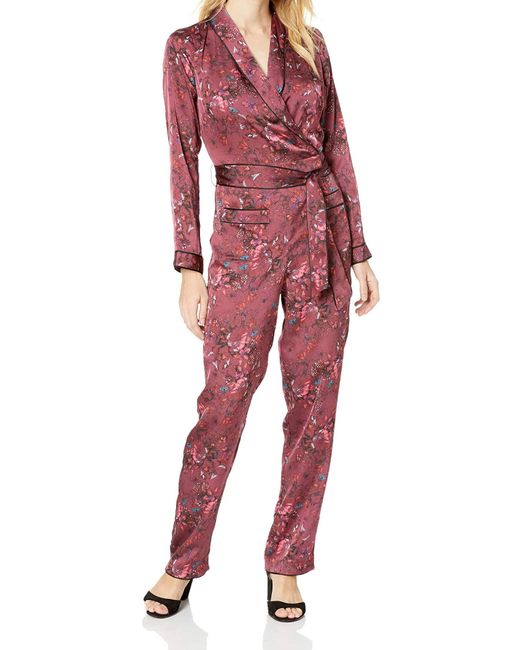Long Sleeve Hugh Jumpsuit di Guess in Red